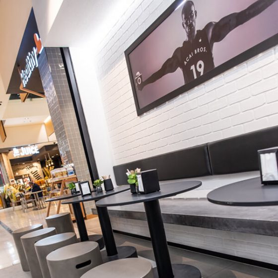 Dura Tumbled brick profile from DuraBric, applied to retail fit-out and painted – Acai Brothers Super Food Bar, Canberra