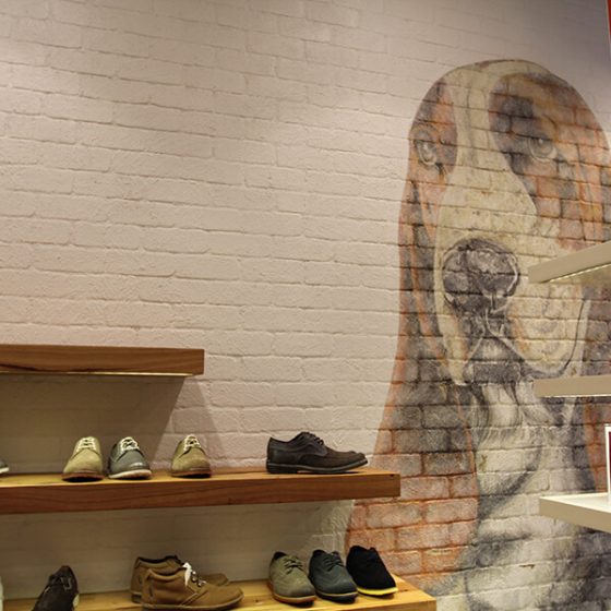 Traditional Dura Tumbled brick profile from DuraBric with painted wall and mural – Grosby Shoes, Melbourne