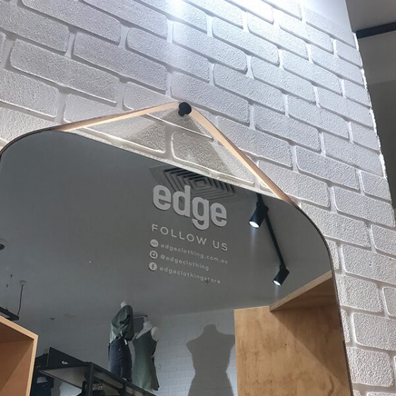 Dura Tumbled brick profile from DuraBric, applied to retail fit-out and painted – Edge Clothing store, Plenty Valley Shopping Centre, South Morang, Melbourne